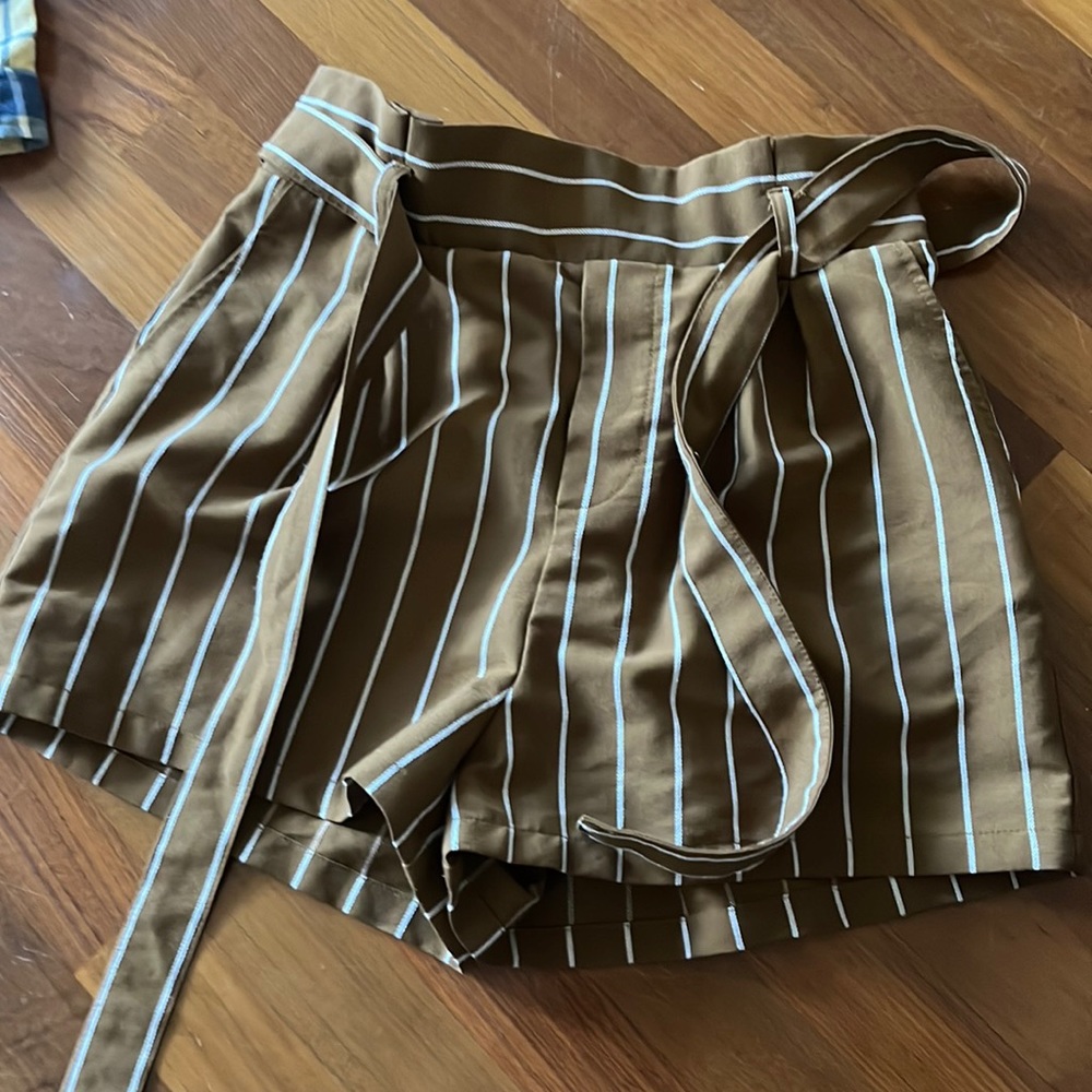 brown and white shorts